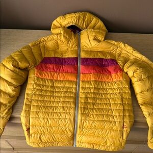 Cotopaxi Yellow Puffer Jacket with Orange and Purple Accents